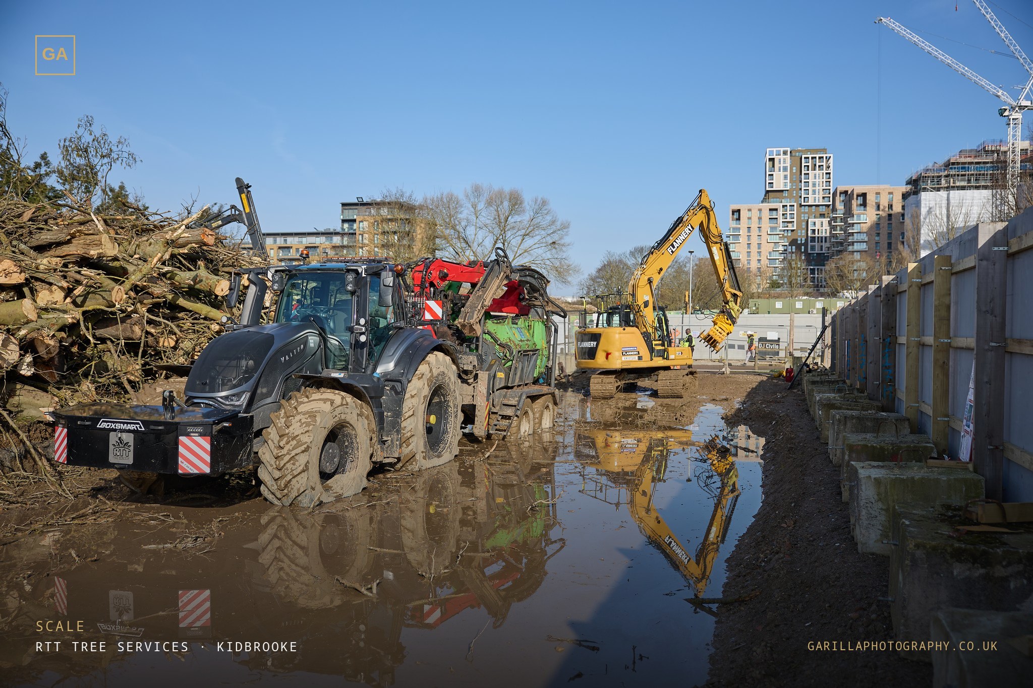 Felled timber beside the development — Scale
